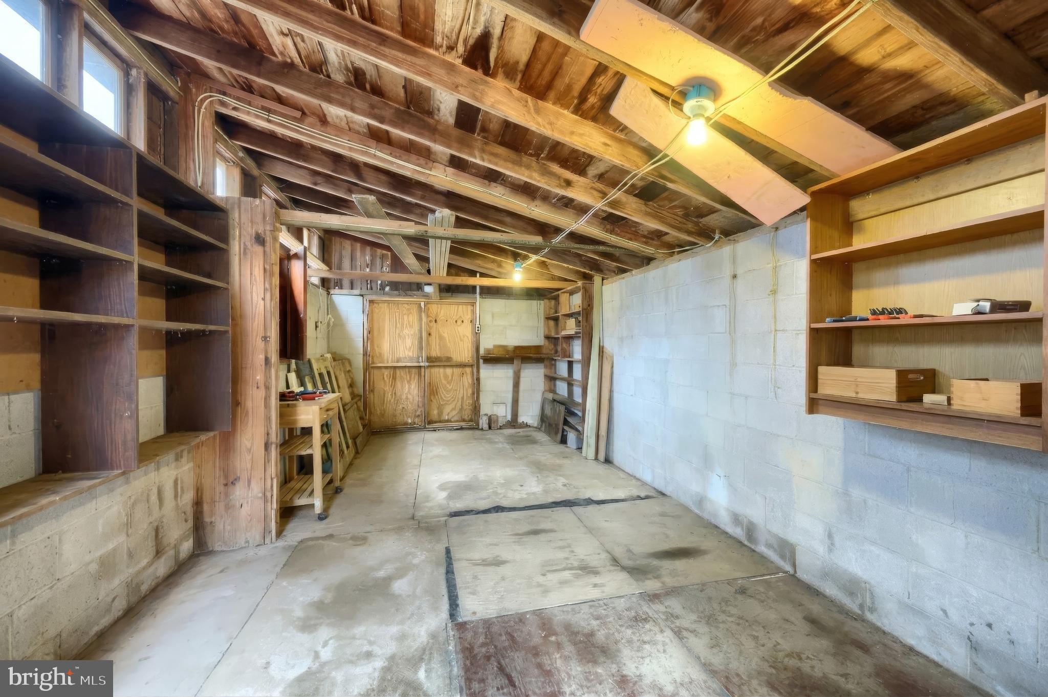 754 Bridgeton Road Fawn Grove, PA 17321 - Photo 14 of 42 a view of under construction room and wooden shelves