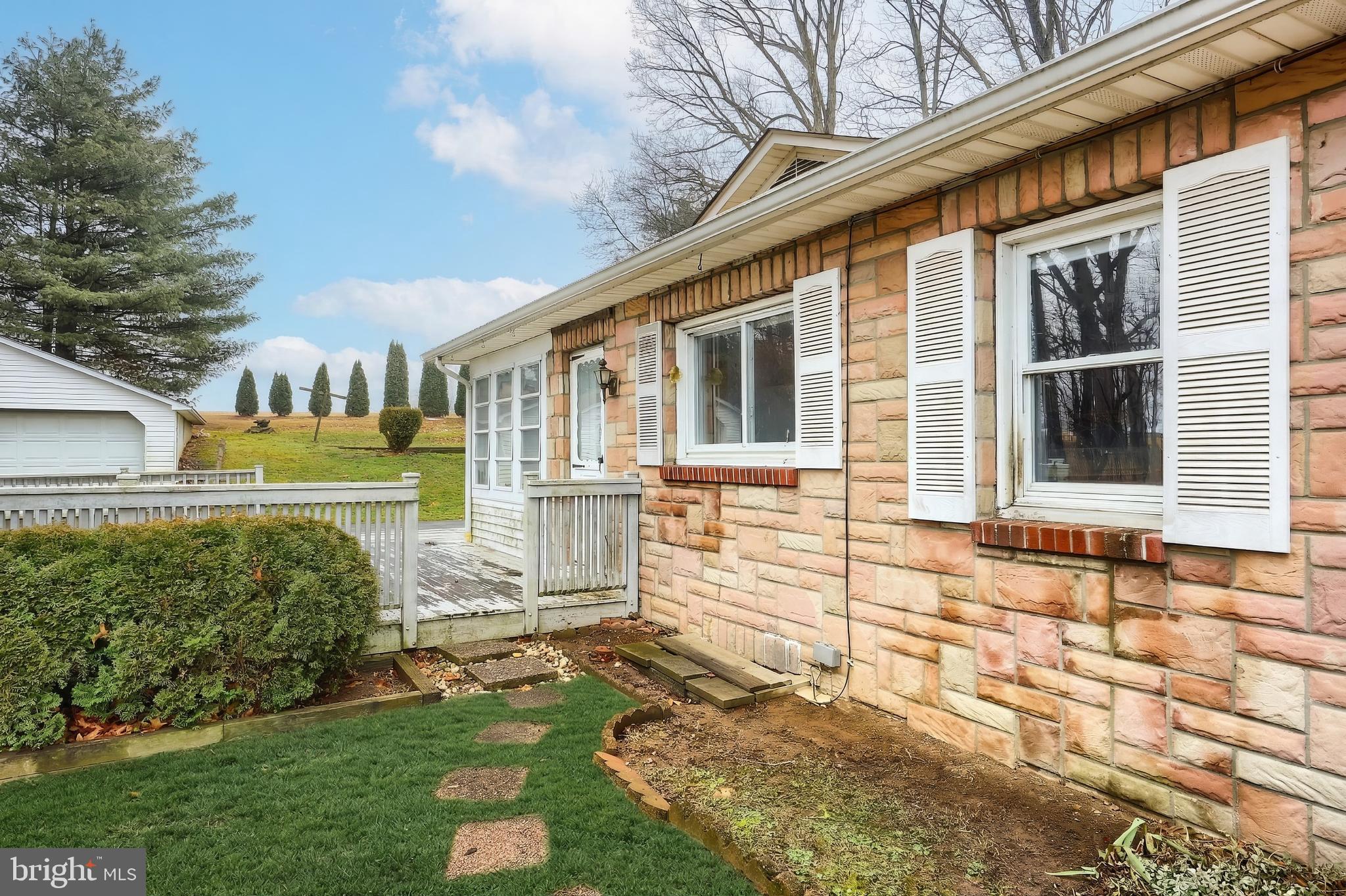 754 Bridgeton Road Fawn Grove, PA 17321 - Photo 18 of 42 a front view of a house with a yard