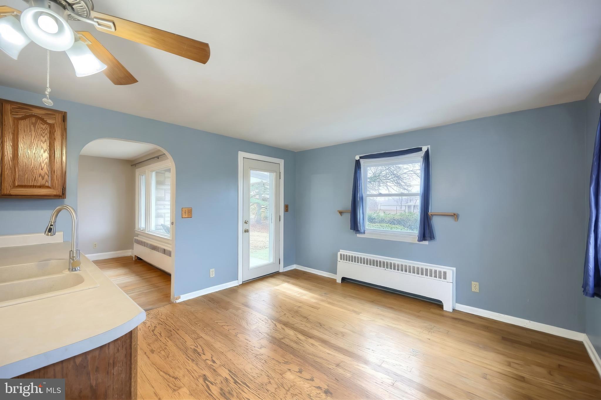 754 Bridgeton Road Fawn Grove, PA 17321 - Photo 23 of 42 a bedroom with a bed and a chandelier