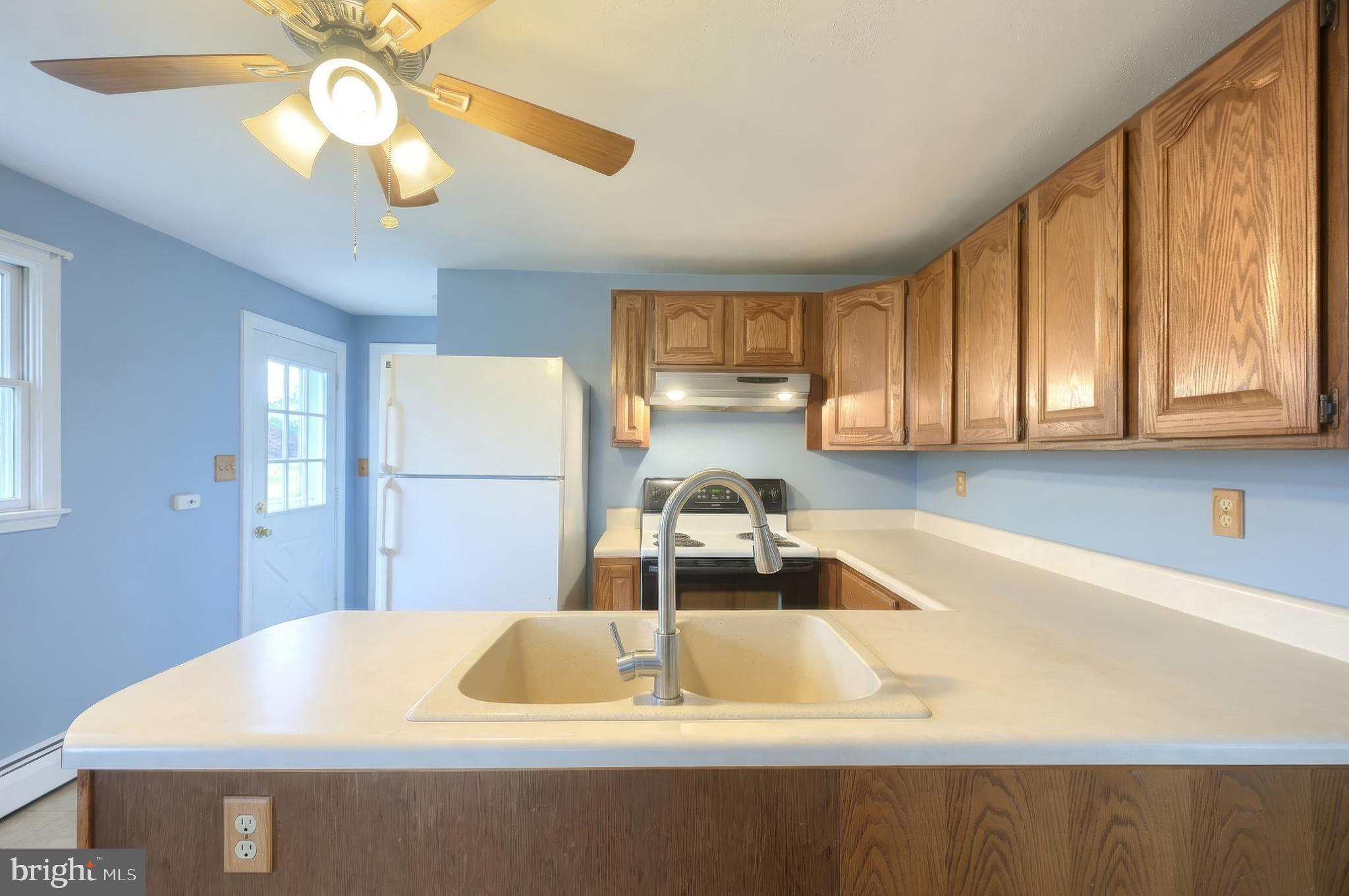 754 Bridgeton Road Fawn Grove, PA 17321 - Photo 25 of 42 a bathroom with a sink a bathtub and a window