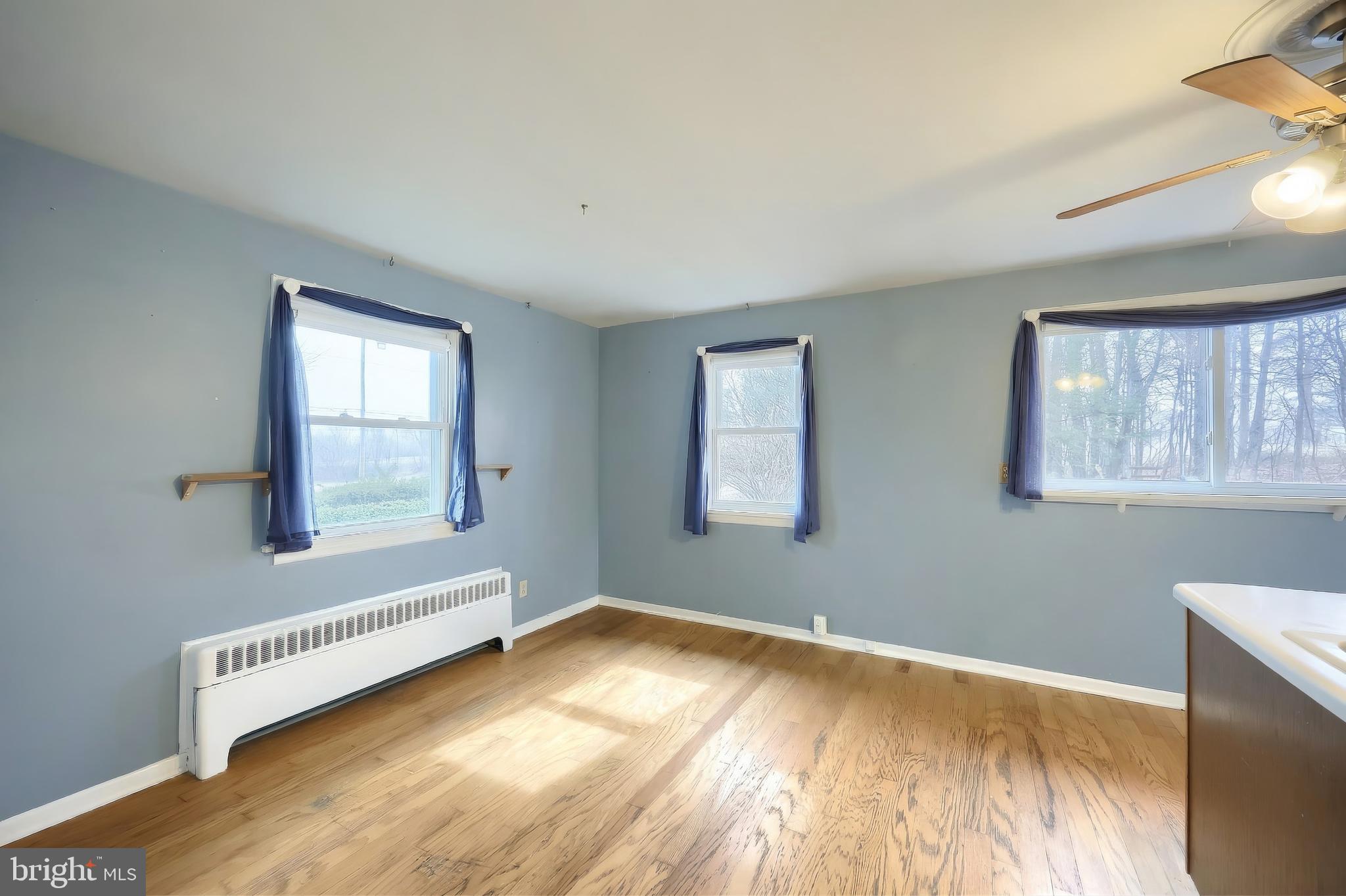 754 Bridgeton Road Fawn Grove, PA 17321 - Photo 26 of 42 a view of wooden floor and windows in a room