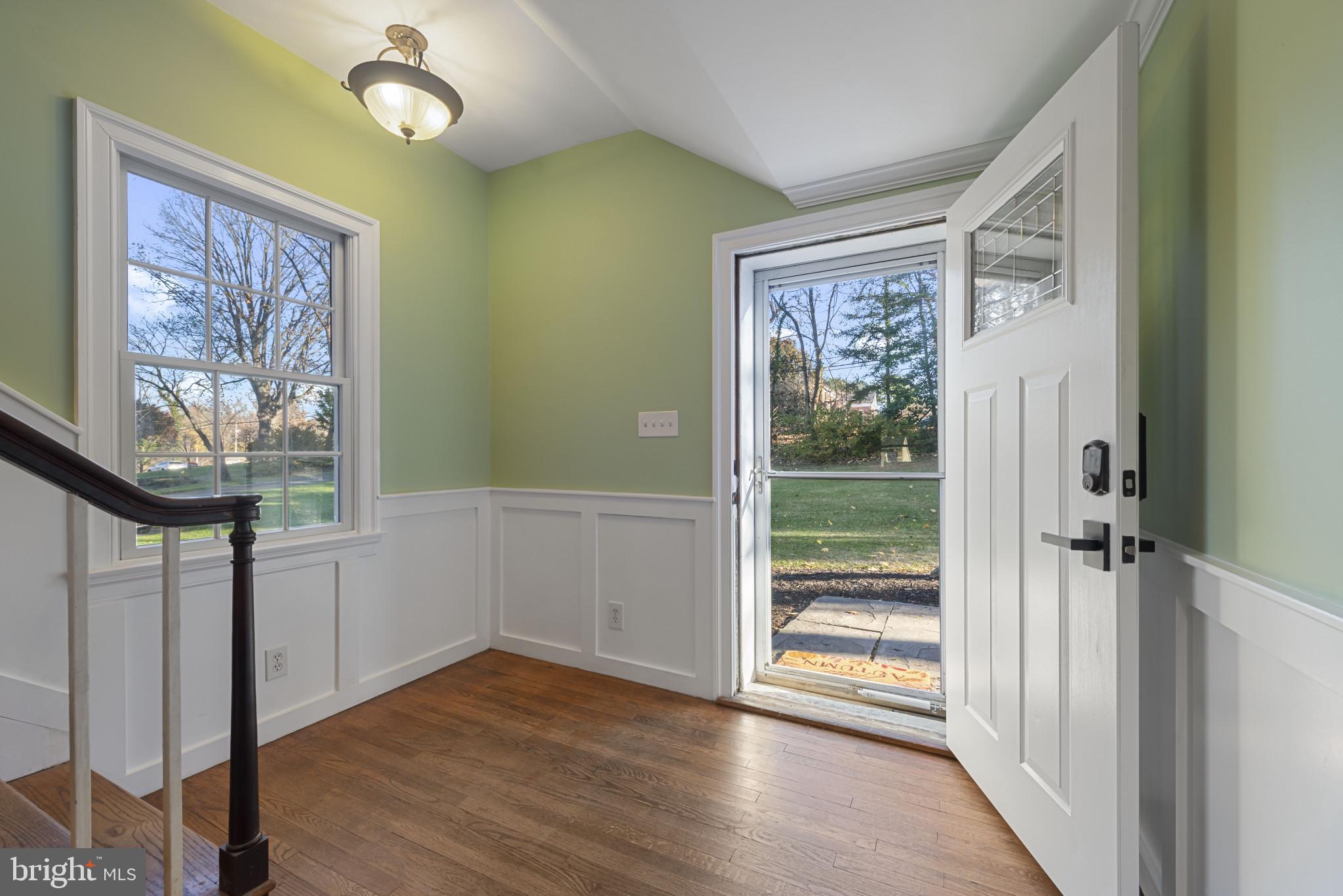 504 Hampton Lane Baltimore, MD 21286 - Photo 2 of 31 a view of front door with wooden floor