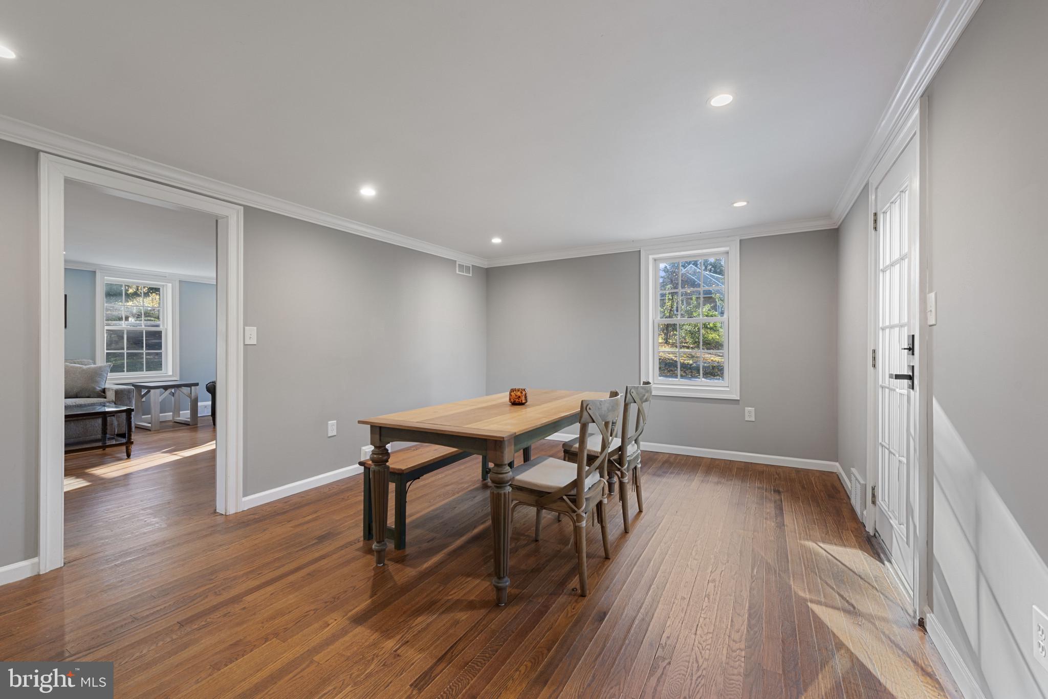 504 Hampton Lane Baltimore, MD 21286 - Photo 5 of 31 a workspace with furniture window and wooden floor