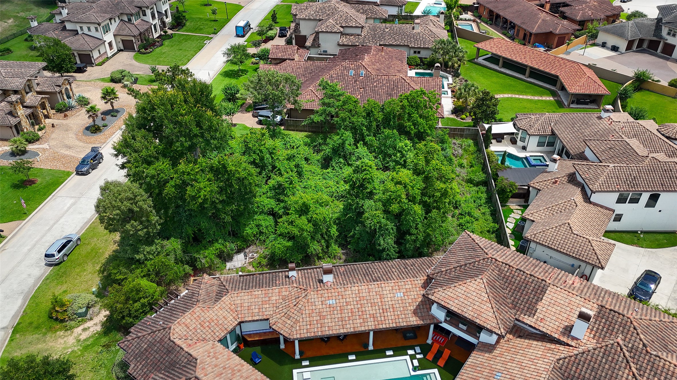 39 Post Shadow Estate Drive Spring, TX 77389 - Photo 5 of 19 an aerial view of a house with garden space and street view