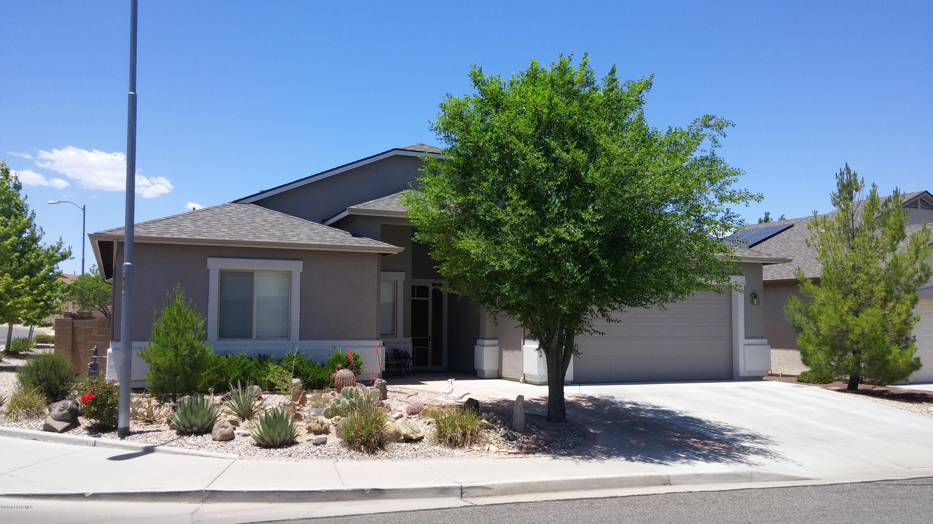 4702 Edgemont Road Prescott Valley, AZ 86314 - Photo 1 of 21 a front view of a house with porch