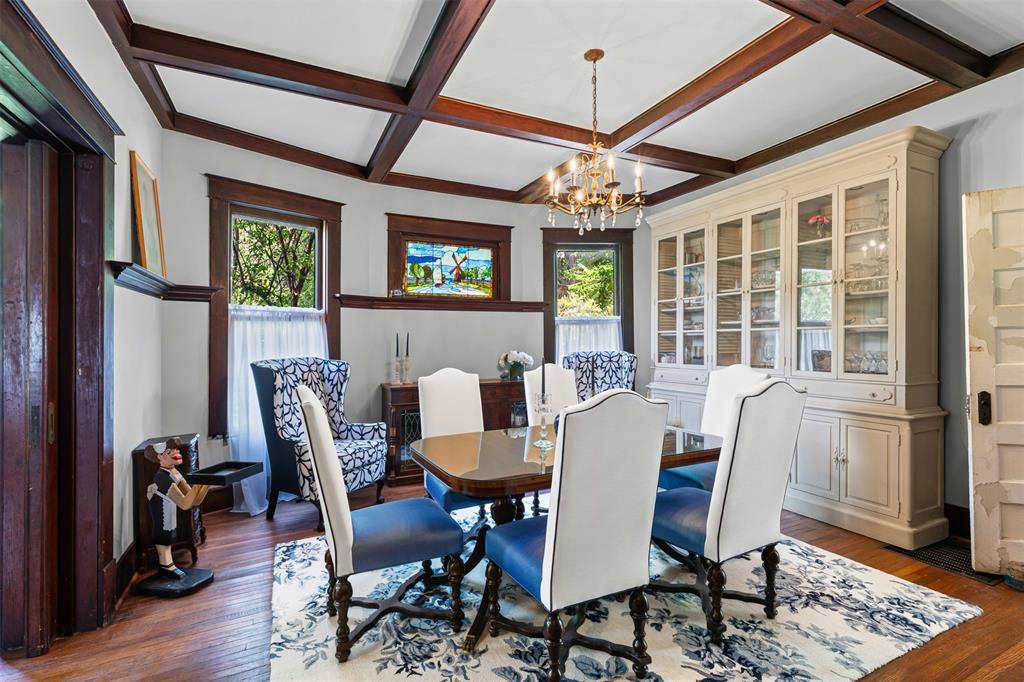 4606 East Side Avenue Dallas, TX 75226 - Photo 11 of 38 a view of a dining room with furniture a chandelier and wooden floor
