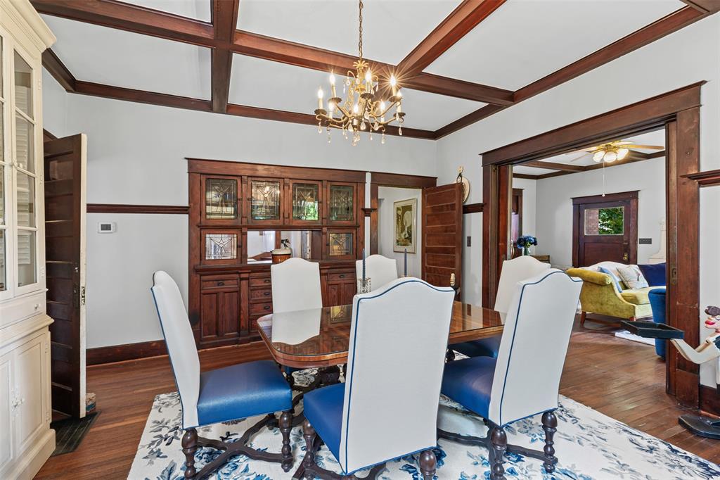 4606 East Side Avenue Dallas, TX 75226 - Photo 12 of 38 a dining room with furniture a chandelier and wooden floor