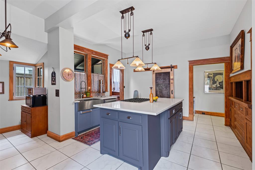 4606 East Side Avenue Dallas, TX 75226 - Photo 13 of 38 a kitchen with a counter top space appliances and cabinets