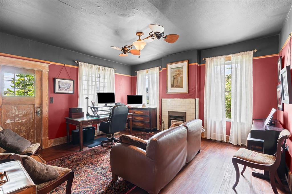 4606 East Side Avenue Dallas, TX 75226 - Photo 21 of 38 a living room with furniture fireplace and a large window