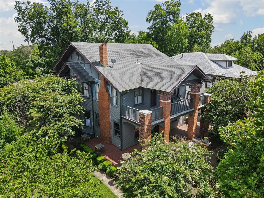 4606 East Side Avenue Dallas, TX 75226 - Photo 34 of 38 an aerial view of a house with a yard and large trees