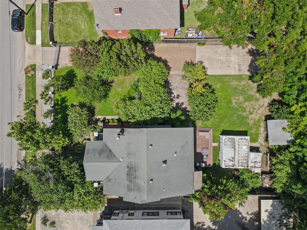4606 East Side Avenue Dallas, TX 75226 - Photo 35 of 38 an aerial view of a house with a garden and a yard