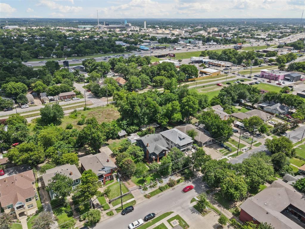 4606 East Side Avenue Dallas, TX 75226 - Photo 36 of 38 an aerial view of residential houses with outdoor space and trees