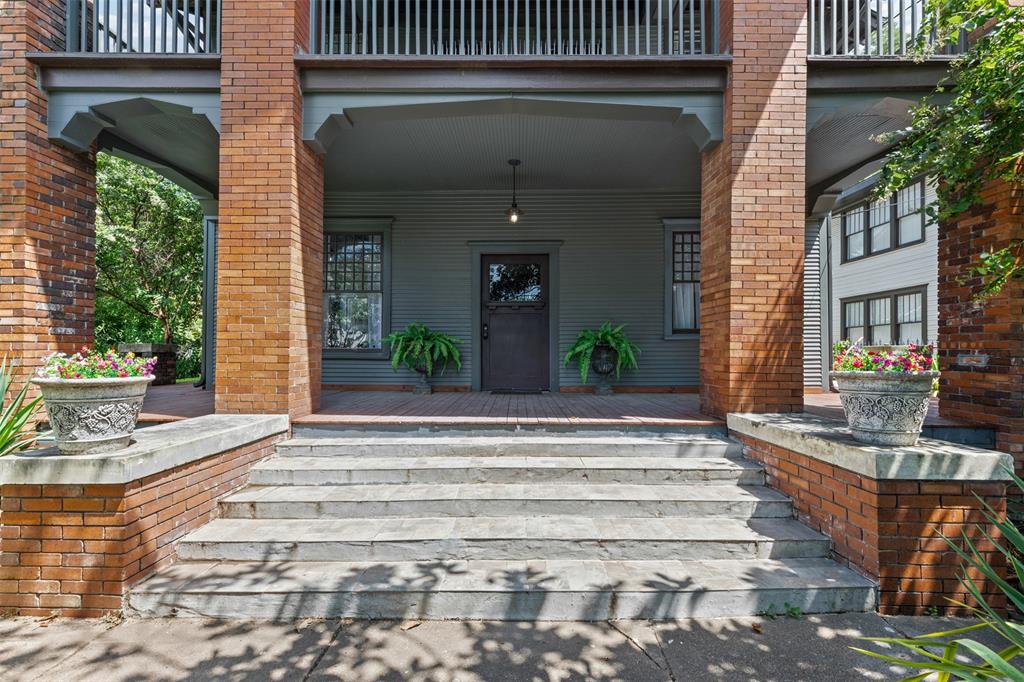 4606 East Side Avenue Dallas, TX 75226 - Photo 4 of 38 a view of a brick house with many windows
