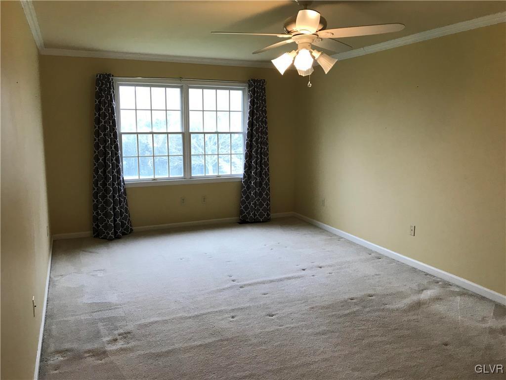 10 Frys Run Road Easton, PA 18042 - Photo 27 of 44 an empty room with windows and fan