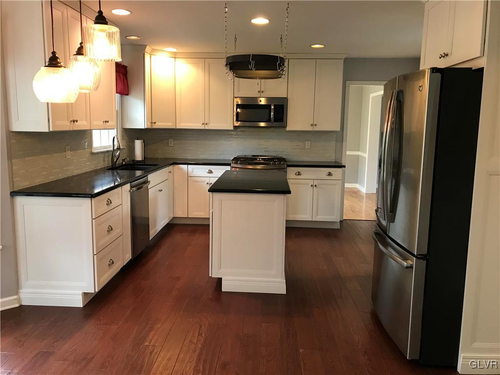 10 Frys Run Road Easton, PA 18042 - Photo 3 of 44 a kitchen with a white cabinets and stainless steel appliances