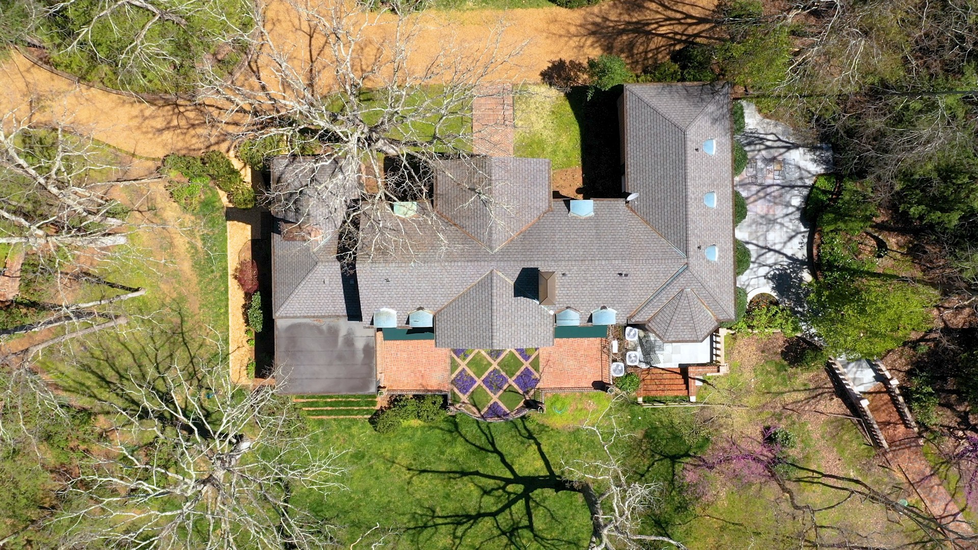 305 Clara's Point Road Sewanee, TN 37375 - Photo 4 of 46 an aerial view of a house with a yard and garden