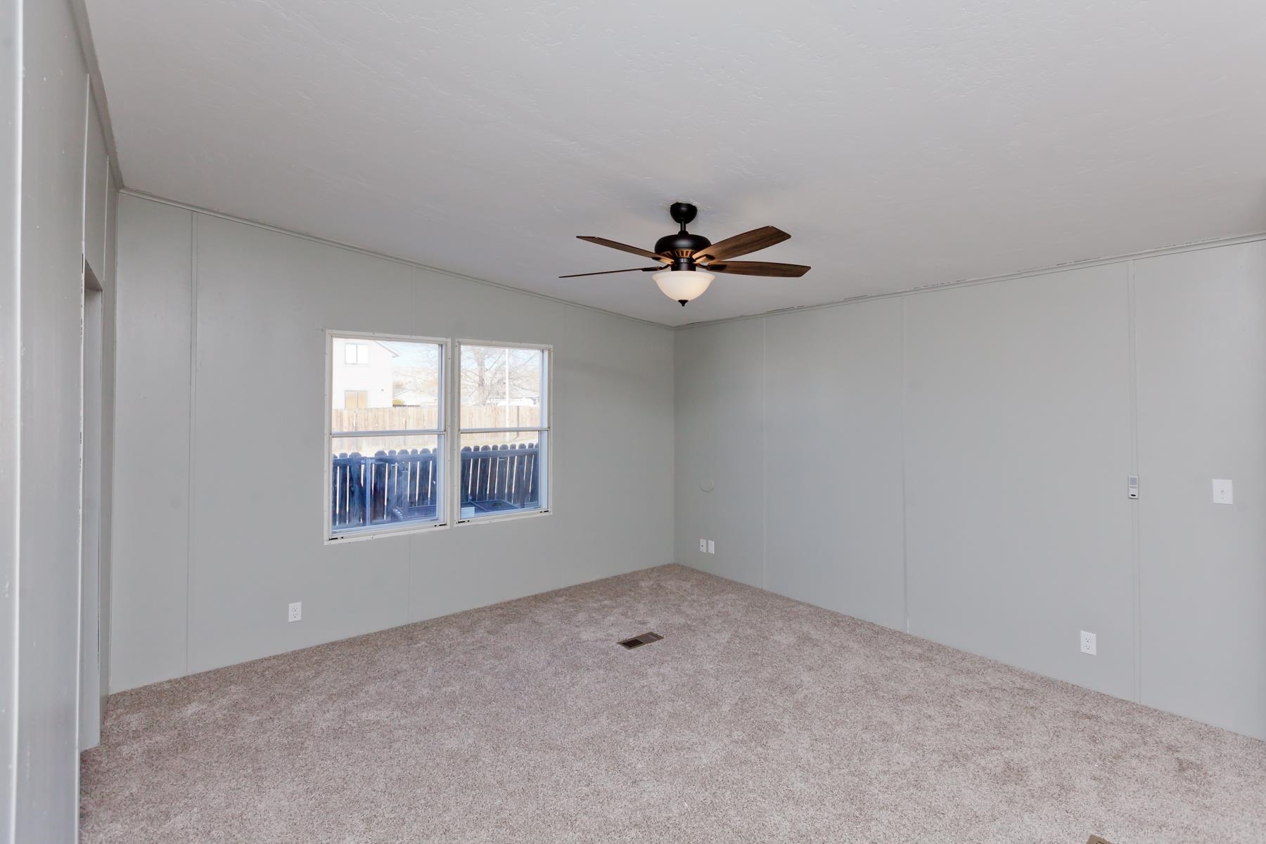 3066 Cardinal Court Grand Junction, CO 81504 - Photo 13 of 41 a view of an empty room with a window