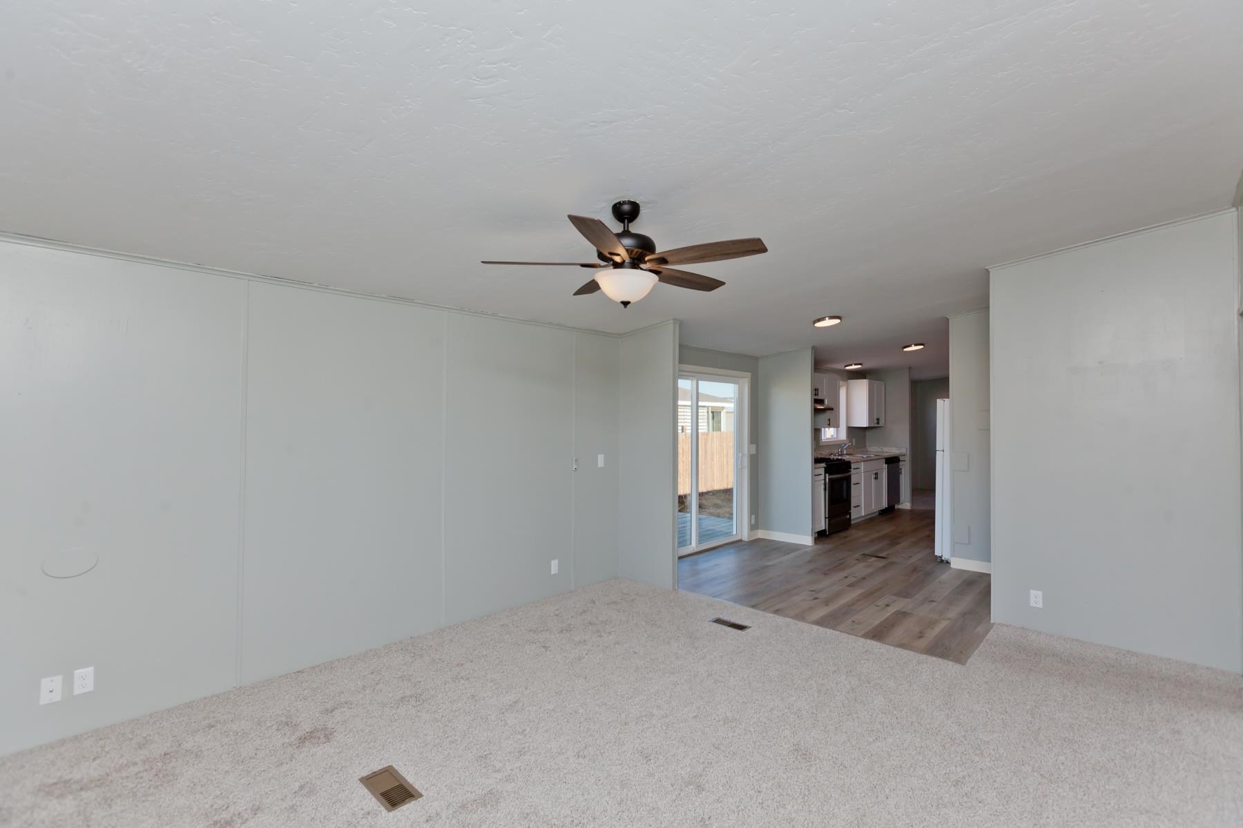 3066 Cardinal Court Grand Junction, CO 81504 - Photo 16 of 41 an empty room with closet and windows