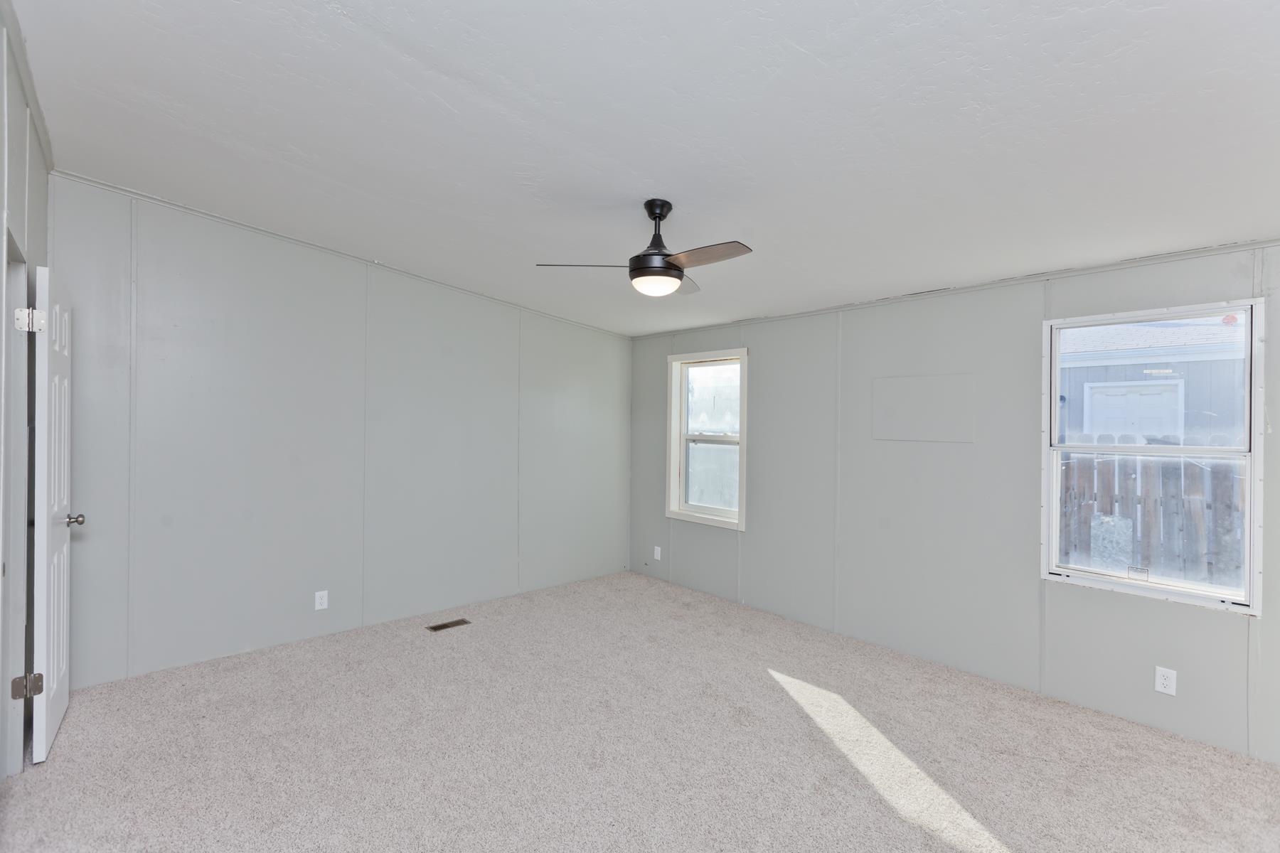 3066 Cardinal Court Grand Junction, CO 81504 - Photo 17 of 41 a view of an empty room with a window