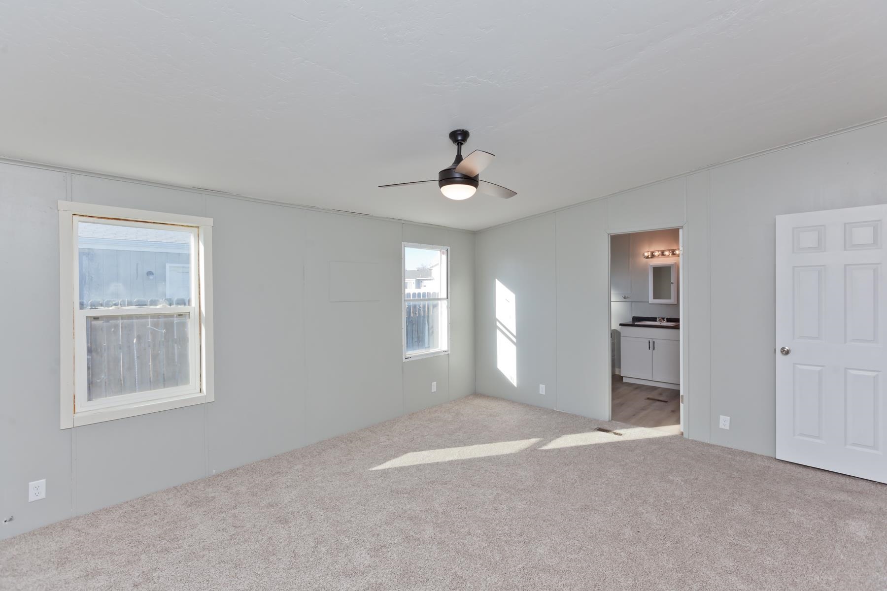 3066 Cardinal Court Grand Junction, CO 81504 - Photo 18 of 41 a view of an empty room with a window