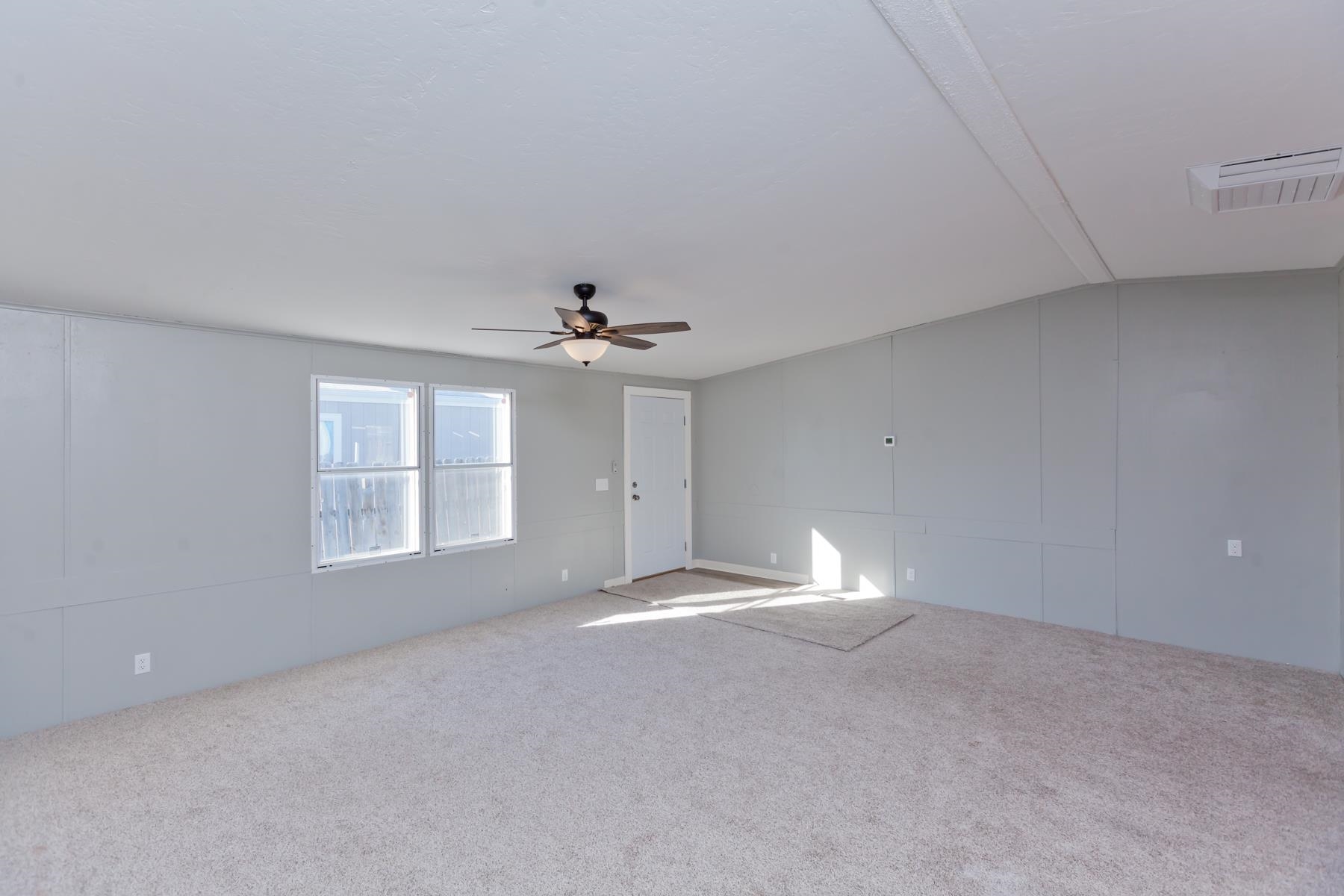 3066 Cardinal Court Grand Junction, CO 81504 - Photo 2 of 41 a view of an empty room with a window
