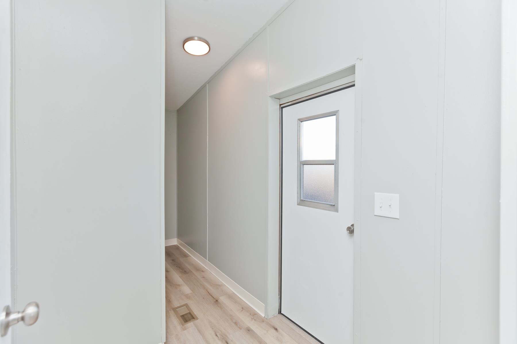 3066 Cardinal Court Grand Junction, CO 81504 - Photo 25 of 41 a view of a hallway with closet
