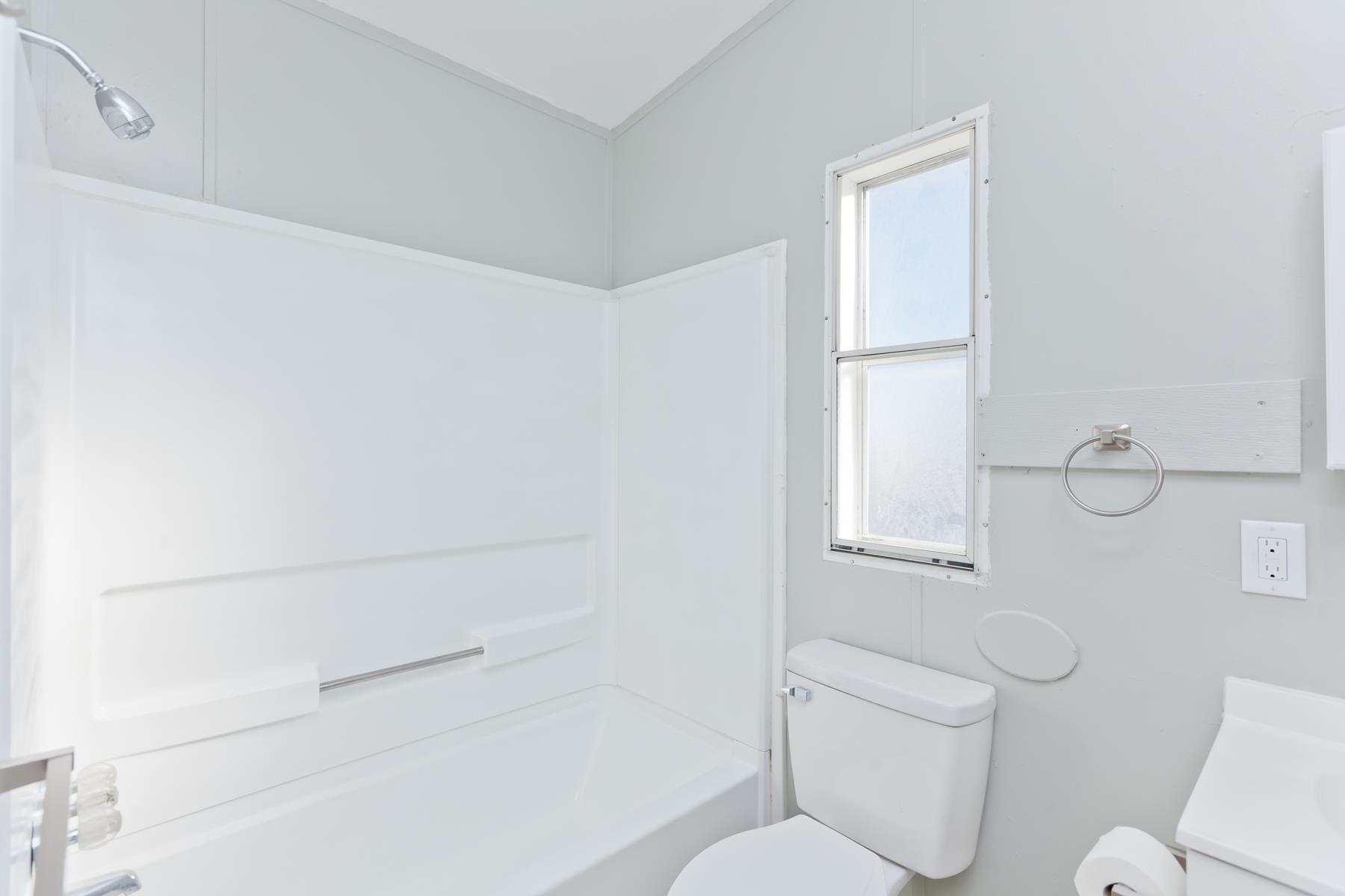 3066 Cardinal Court Grand Junction, CO 81504 - Photo 30 of 41 a bathroom with a toilet and a shower