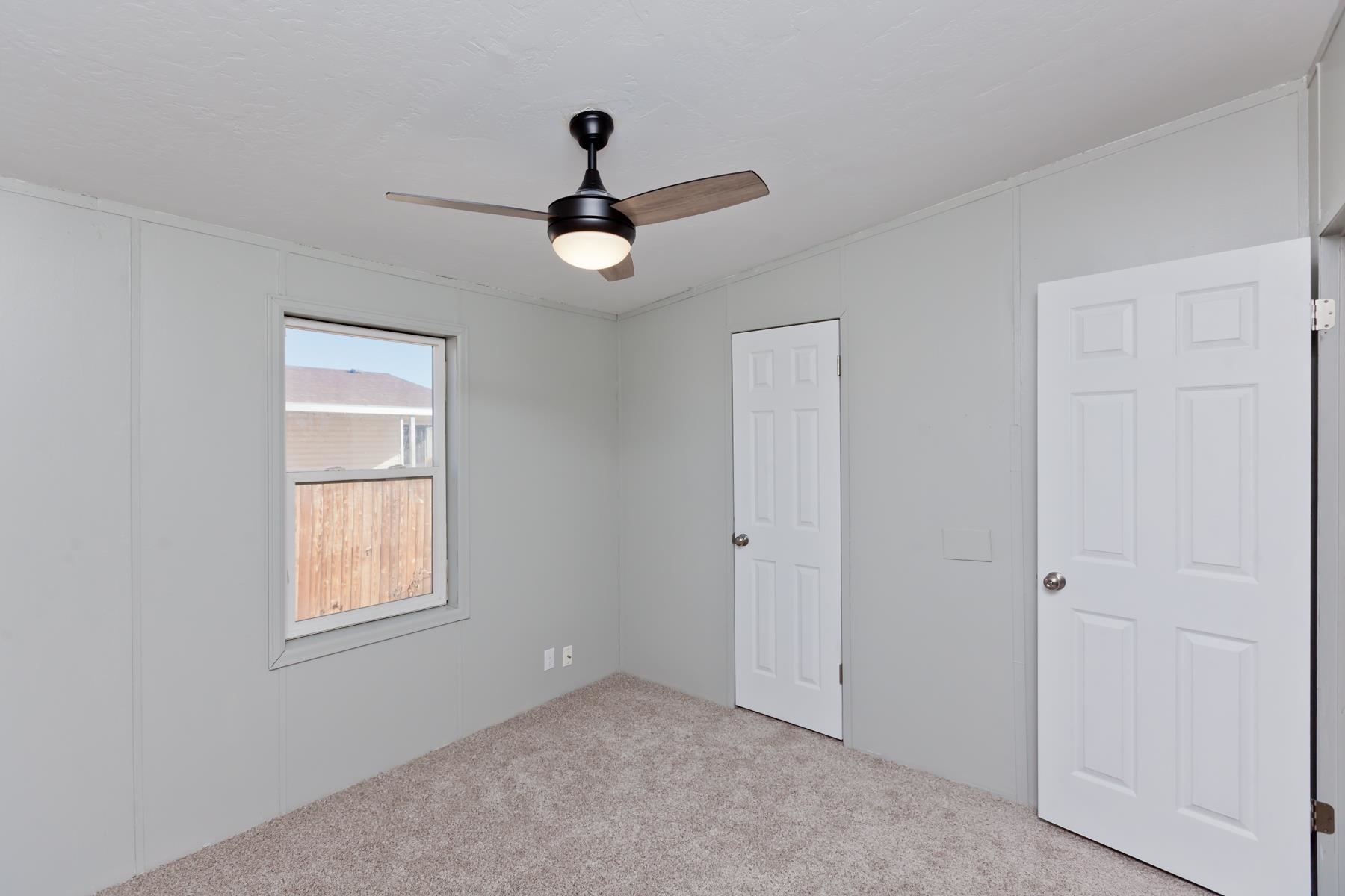 3066 Cardinal Court Grand Junction, CO 81504 - Photo 34 of 41 a view of an empty room with a window