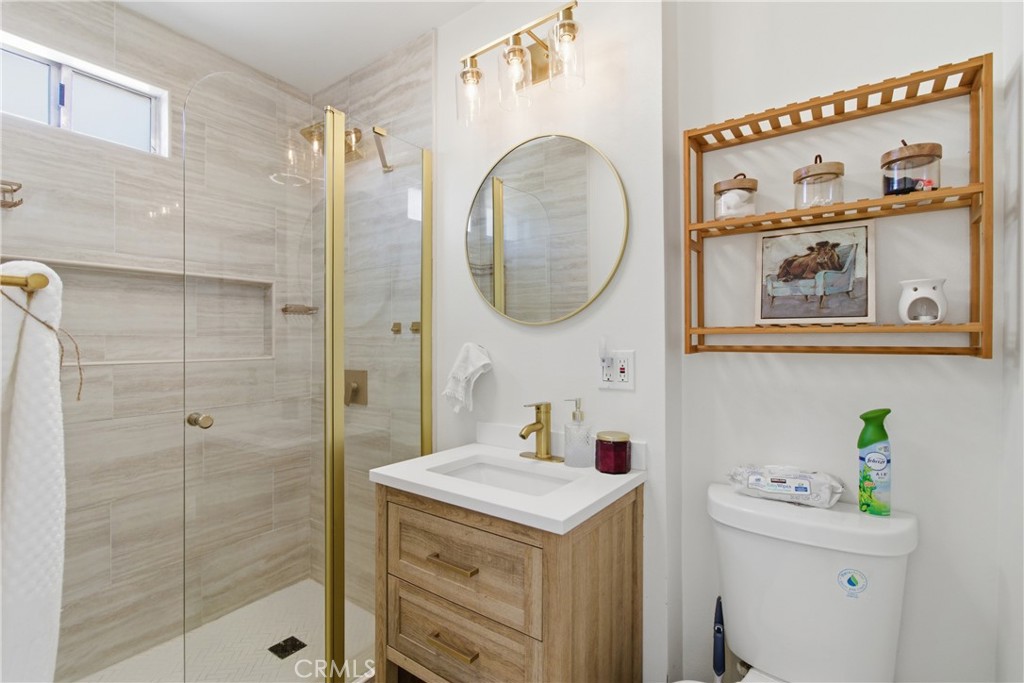 3552 Condalia Avenue Yucca Valley, CA 92284 - Photo 20 of 30 a bathroom with a sink a vanity and a mirror