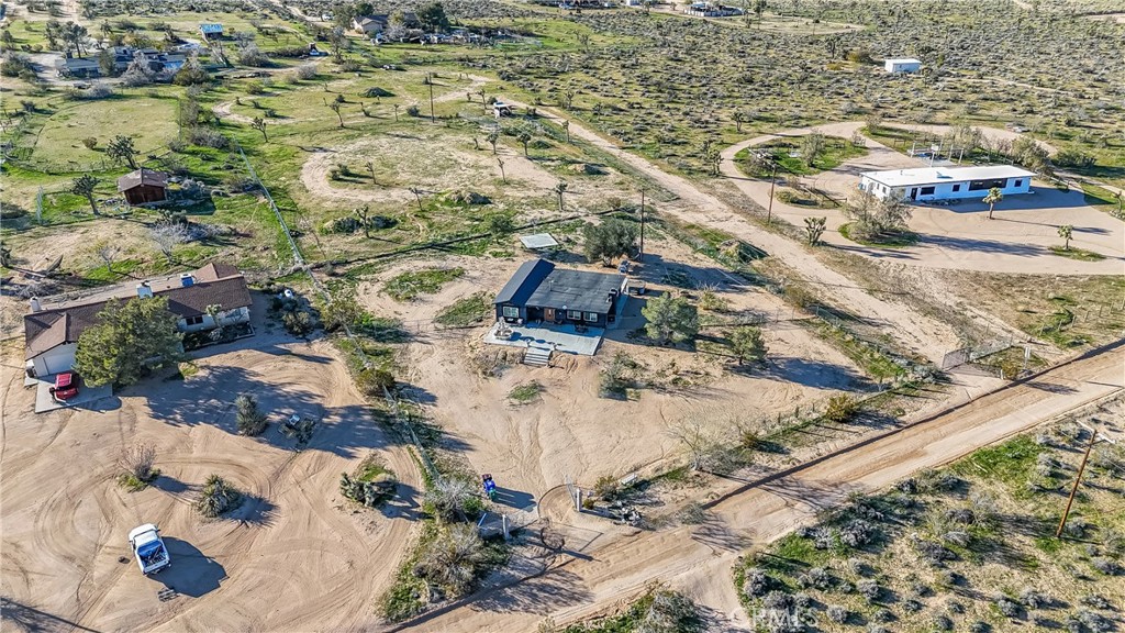 3552 Condalia Avenue Yucca Valley, CA 92284 - Photo 22 of 30 an aerial view of residential houses with outdoor space