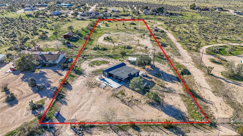 3552 Condalia Avenue Yucca Valley, CA 92284 - Photo 27 of 30 an aerial view of residential houses with outdoor space