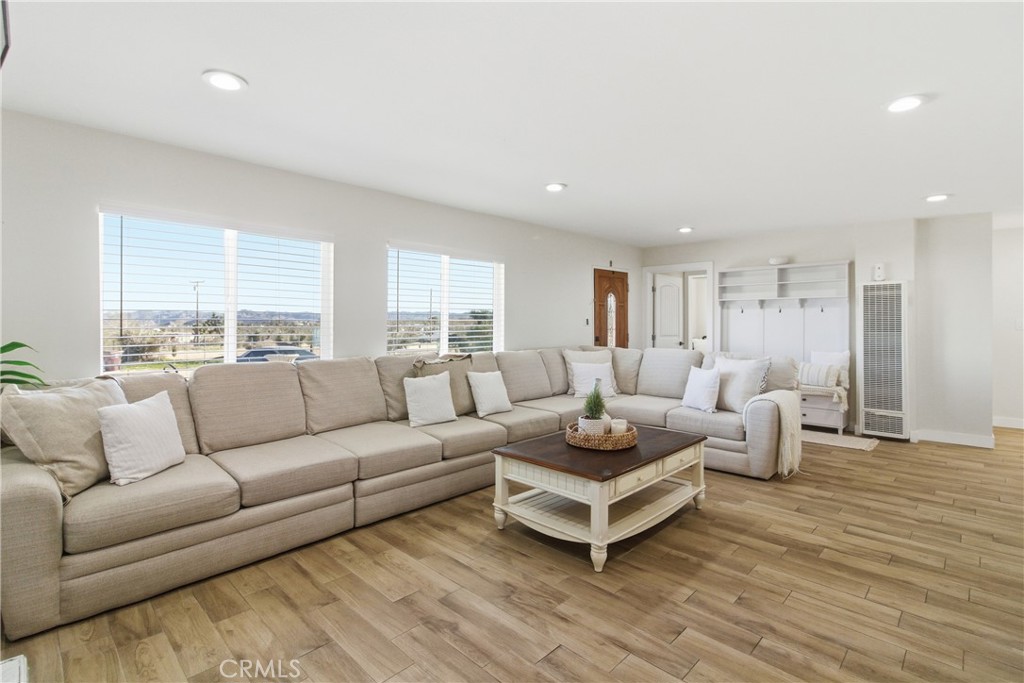 3552 Condalia Avenue Yucca Valley, CA 92284 - Photo 4 of 30 a living room with furniture and a large window