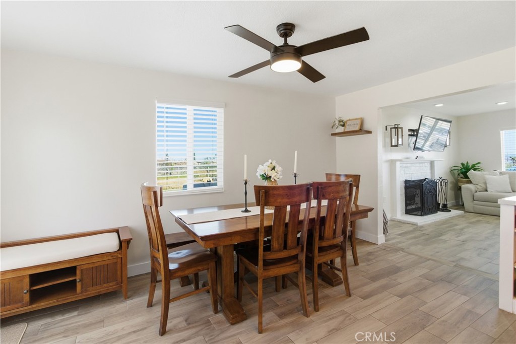 3552 Condalia Avenue Yucca Valley, CA 92284 - Photo 6 of 30 a dining room with furniture and window