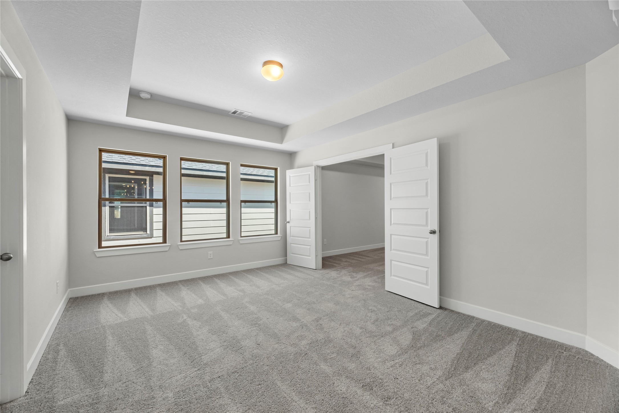 5023 Nesbit Path Rosenberg, TX 77471 - Photo 16 of 25 an empty room with windows