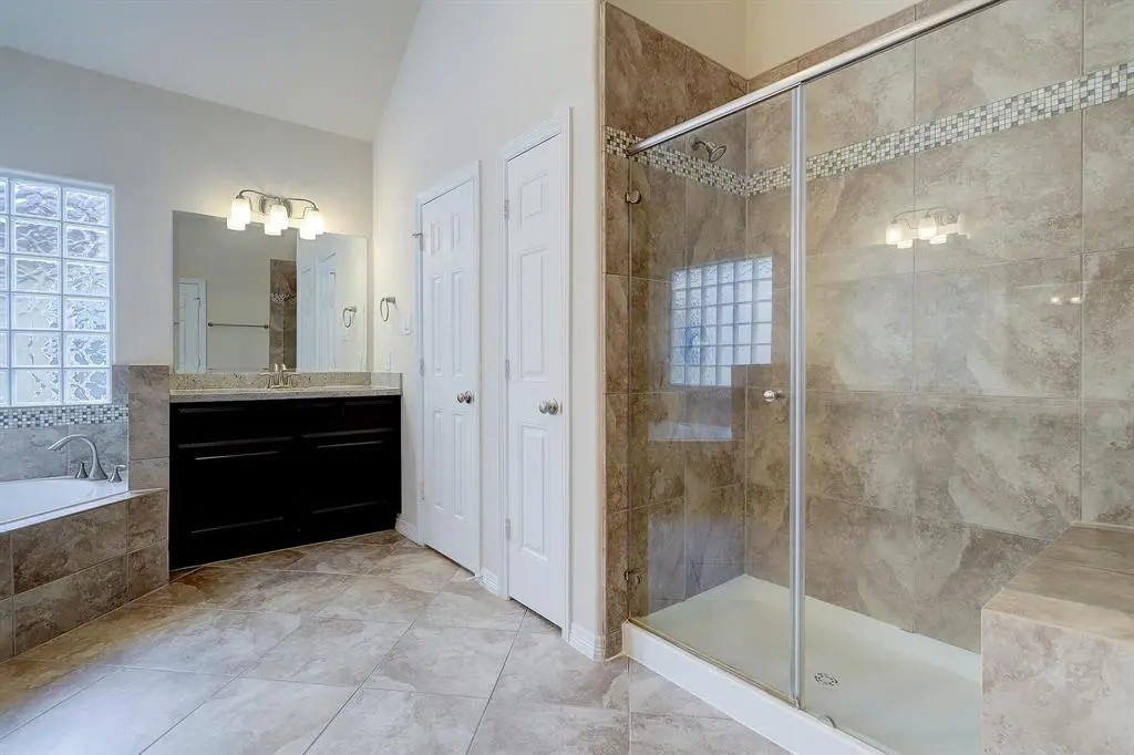 5505 Zoemark Lane Houston, TX 77021 - Photo 8 of 9 a bathroom with a shower and a sink