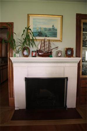 8 Summit Avenue Hull, MA 02045 - Photo 12 of 30 a view of living room with a fireplace and wooden floor