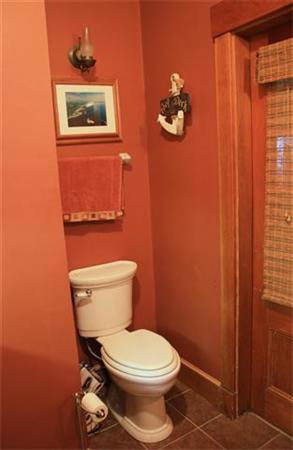 8 Summit Avenue Hull, MA 02045 - Photo 17 of 30 a white toilet sitting next to a small bathroom