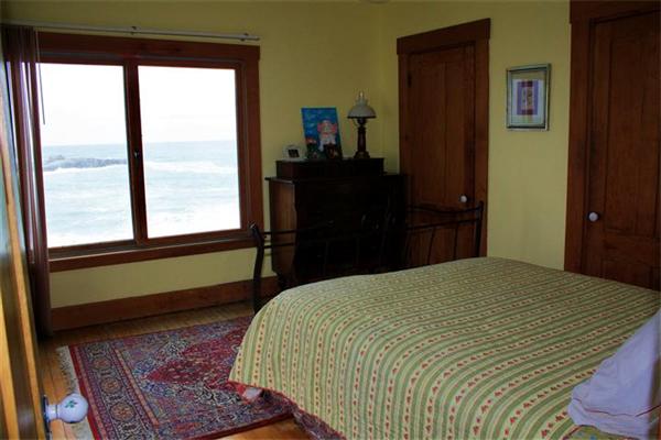 8 Summit Avenue Hull, MA 02045 - Photo 21 of 30 a bedroom with a bed windows and a large window