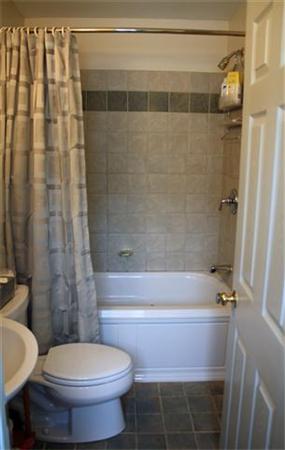 8 Summit Avenue Hull, MA 02045 - Photo 22 of 30 a bathroom with a shower and a toilet
