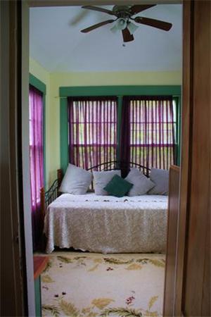 8 Summit Avenue Hull, MA 02045 - Photo 25 of 30 a living room with a bed furniture and a window