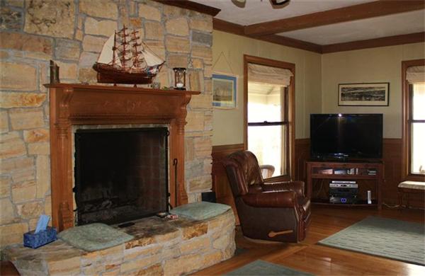 8 Summit Avenue Hull, MA 02045 - Photo 8 of 30 a living room with furniture and a flat screen tv