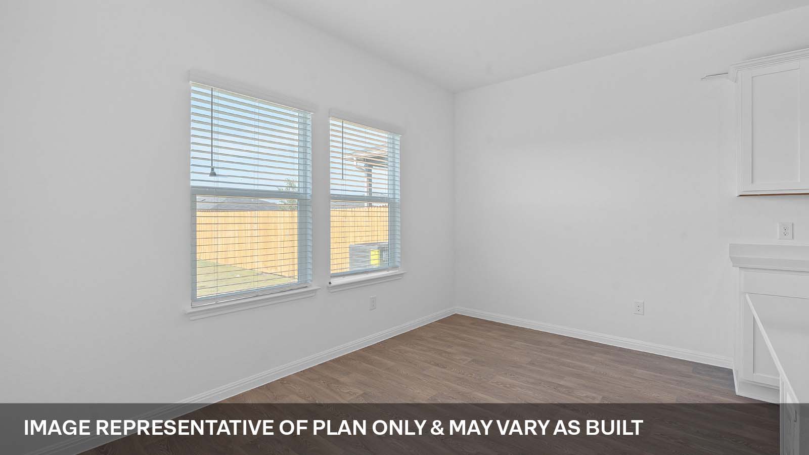 424 Mountain Pea Road Kyle, TX 78640 - Photo 12 of 25 a view of an empty room with a window