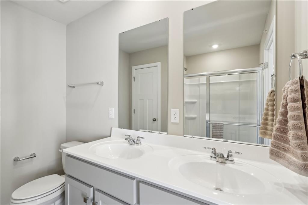 136 River Ridge Drive Coraopolis, PA 15108 - Photo 26 of 28 a bathroom with a sink toilet and shower