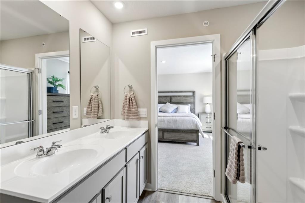 136 River Ridge Drive Coraopolis, PA 15108 - Photo 27 of 28 a en suite bathroom with a double vanity sink and a mirror