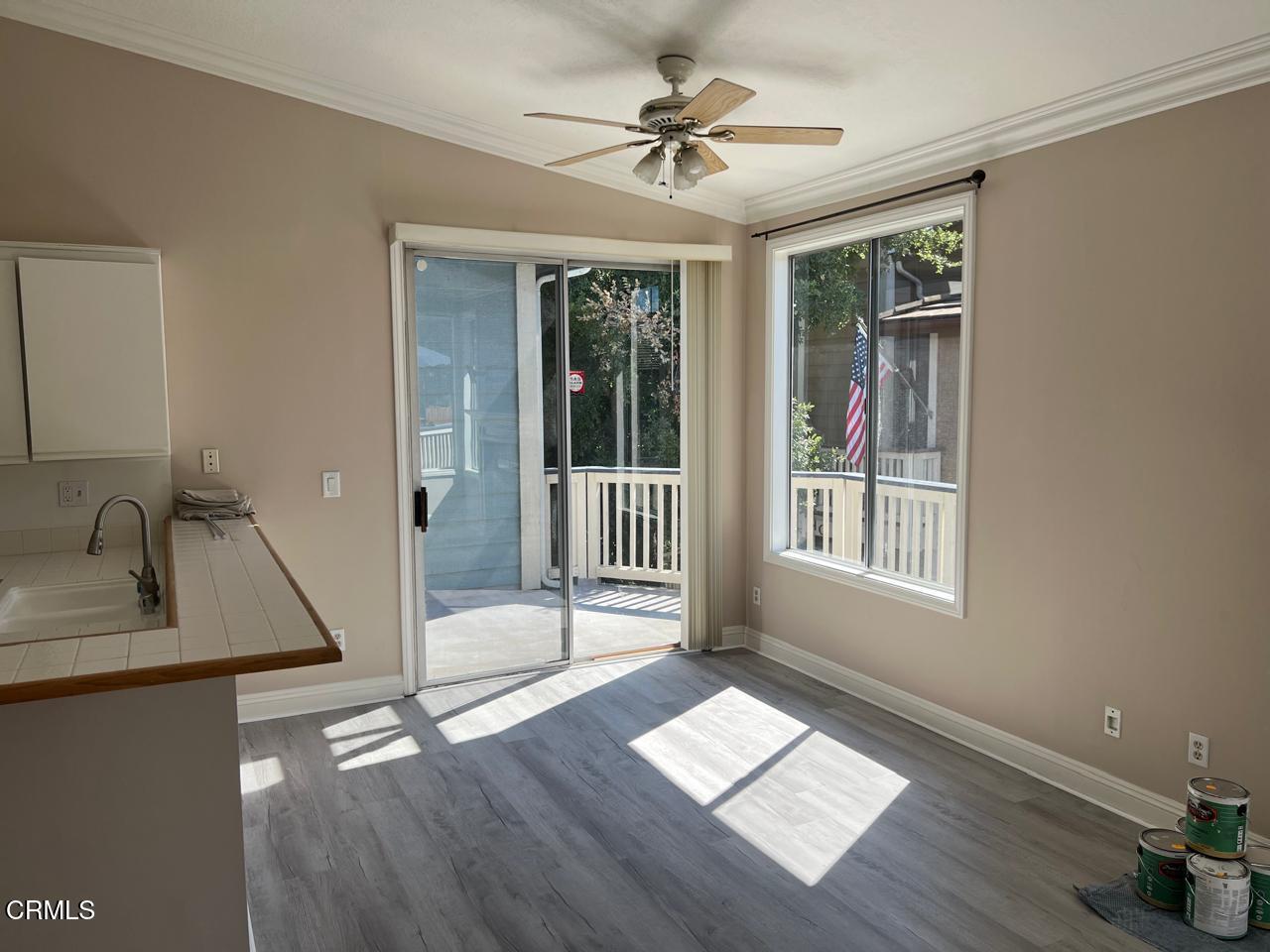 2394 Pleasant Way, Unit J Thousand Oaks, CA 91362 - Photo 3 of 12 a very nice looking room with wooden floor and a window