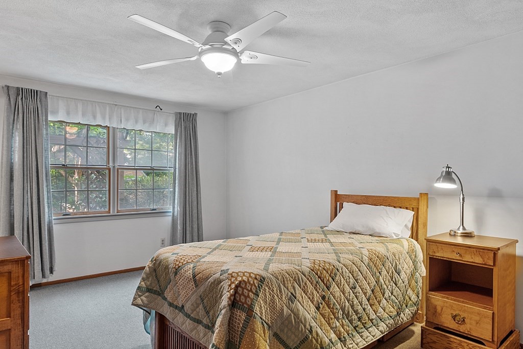10 Bonanza Road Chelmsford, MA 01824 - Photo 21 of 41 a bedroom with a bed and a window