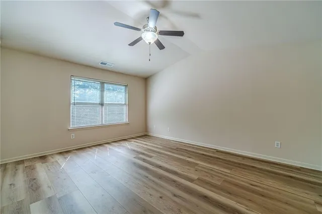 a bathroom with a double vanity sink and mirror with shower