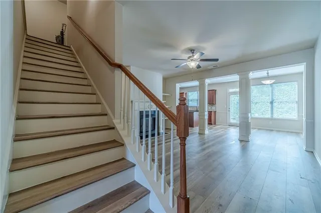 a view of entryway with wooden floor