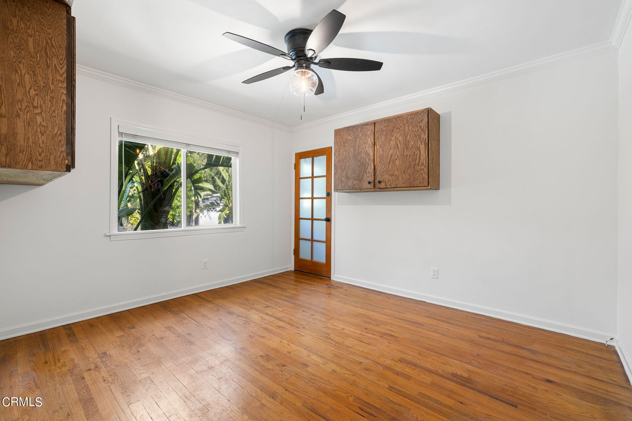 3127 Thurin Avenue Altadena, CA 91001 - Photo 14 of 23 a view of an empty room with window and wooden floor