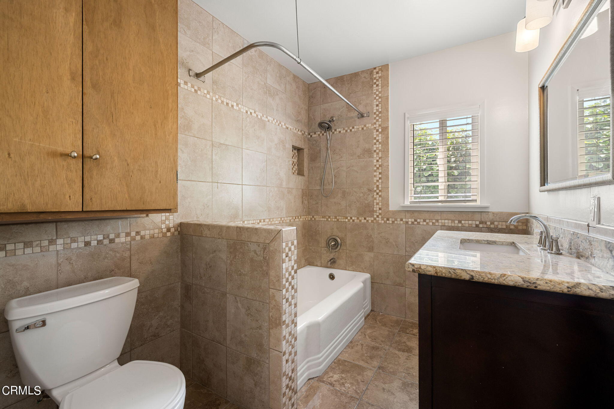3127 Thurin Avenue Altadena, CA 91001 - Photo 15 of 23 a bathroom with a granite countertop toilet sink and mirror